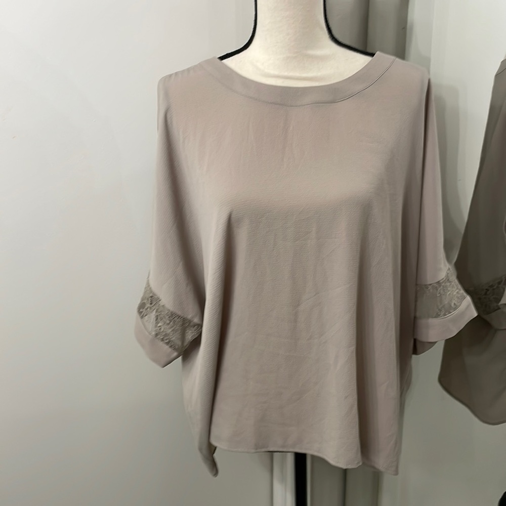 Taupe colored short sleeve blouse